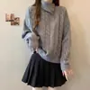 Nuevo suéter de punto trenzado para otoño e invierno, de cuello alto, que se ajusta a los hombros, usado como capa exterior, con un ajuste asimétrico y holgado, diseño versátil y un elegante top de punto