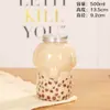Taza de té de leche alta transparente para mascotas empaque de plástico para llevar botella gruesa en forma de U tarro de almacenamiento Fish Pot logo impreso en stock