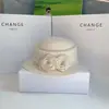 Chapéu de pérola com camélia estilo Hepburn, chapéu de pescador elegante retrô francês, chapéu de pescador de lã versátil para mulheres