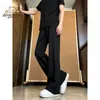 Pantalones Holgados de Calle para Hombre Otoño 2026, Estilo Retro Simple de Hong Kong, Elegantes y Adelgazantes, Hacen que las Piernas Parezcan Largas, Ligeramente Acampanados, Modernos