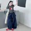 Conjunto de dos piezas para niños mayores: camiseta de manga corta con estampado de letras primavera-verano y pantalones casuales de pierna ancha con encaje, de venta transfronteriza