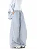 Pantalones casuales bordados de estilo retro para mujeres y hombres, cintura con bloques de color otoñales, pantalones de pierna ancha plisados y curvos