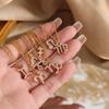 Colgante Verano Xiangfeng doce constelaciones Aries león gitano estrella collar de acero de titanio chapado en oro real de 18 quilates