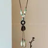Nuevo Collar con Colgante de Cerámica y Cuentas Estilo Retro Chino para Mujer 2026 Nuevo Modelo Estilo Nacional Cadena Larga para Suéter Accesorio Personalizado