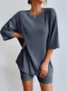 Traje de dos piezas de punto casual de color liso para mujer, de moda, transfronterizo europeo y americano, nuevo 2024, verano, cuello redondo, holgado