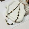 Collar de Acero de Titanio con Piedra Ojo de Tigre Hecho a Mano con Cuentas, Versátil para Apilar, Cadena Clavicular Personalizada de Alta Gama, Cadena Irregular para Suéter