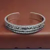 Venta al por mayor s925 plata de ley hecho a mano personalidad retro Marca de moda Hierba Tang Sol Hueco Rayo Apertura pulsera abierta para hombre y mujer
