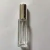 Venta al por mayor de fábrica Botella de perfume cuadrada de vidrio transparente Botella cosmética vacía de vidrio de cristal Botella de spray vacía embotellada