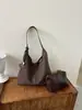 Bolso tote de gran capacidad para mujer, nueva versión coreana 2026, bolso de hombro versátil de moda de alta gama para el trabajo, retro, moderno