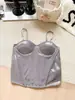 Nuevo producto más vendido de estilo europeo y americano: camisola brillante con corte slim retro, top bustier de espina de pez transpirable y elegante para mujer