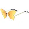 Gafas de sol mariposa medio metal sin montura color caramelo degradado pieza oceánica moda retro tendencia europea y americana gafas de sol al por mayor