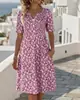 Vestido de Verão Feminino 2026 Novo Transfronteiriço Europeu e Americano com Estampa Floral, Decote V, Comprimento Médio e Mangas Curtas