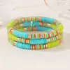 Set de pulseras de arcilla suave coloridas apilables de 6 mm elástico color Morandi bloques de color bohemio pieza metálica