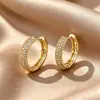 Pendientes de superventas transfronterizos europeos y americanos, cierres de oreja de circonita de cobre, totalmente incrustados de diamantes, adecuados para ir al trabajo, con un toque de lujo ligero y de alta gama, pendientes para mujer