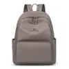 Mochila de nailon de estilo sencillo, gran capacidad, ligera, adecuada para ir al trabajo, uso casual, viajes y para estudiantes universitarios