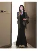 Vestido falda de punto negro estilo cola de pez para mujer, perfecto para llevar debajo de un abrigo en otoño e invierno, un impresionante vestido largo ajustado al cuerpo