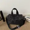 Bolsa casual feminina de grande capacidade 2026 novo modelo bolsa tote almofada de estrela bolsa de ombro transversal simples moderna