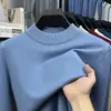 Suéter de cuello alto cruzado al por mayor para hombre, nuevo estilo otoño e invierno 2026, camiseta básica de punto versátil de color liso para hombres de mediana edad