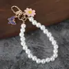 Nuevo colgante de llavero de coche de perlas, lindo accesorio para fundas de auriculares, decoración de bolso, accesorio de cadena colgante para equipaje para mujeres