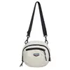 Bolsa de Lona para Mulheres Verão 2025 Nova Estilo Esportivo Outdoor de Viagem Bolsa Transversal para Homens Pequena Bolsa Versátil de Alta Qualidade Estilo Coreano