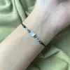 Pulseira de Conchas Gato Preto Livro Vermelho Pequeno, Pulseira Trançada de Contas Feita à Mão, Joia para Casal e Melhor Amigo, Novo Estilo 2026, Puramente Feita à Mão