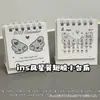 Calendário de Mesa Pequeno Estrela com Asas de Desenho Animado Fofo 2027 Estilo Ins Alto Valor Decoração Mini Ornamento de Mesa para Estudante
