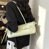 Bolso tipo baguette de alto valor para mujer, para llevar debajo del brazo, pequeño, fresco, versátil, correa de cuero, bolso de un solo hombro, versátil, moderno, bolso de mano para mujer