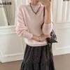 Tienda Insignia Shanghai Danong / Nueva Colección Otoño-Invierno 2026: Abrigo corto de punto grueso de hilo fantasía, estilo relajado, holgado y con cuello redondo.