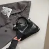 Bolsa Triangular Bonita e Simples Nova Moda Primavera e Verão 2025 Bolsa de Corrente Personalizada Ins Bolsa de Ombro Único Transversal