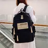 Mochila de Gran Capacidad Transfronteriza 2024 Nueva Simple Letra Mochila Escolar para Estudiante de Secundaria Mochila de Viaje Ligera de Moda