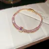 [Cadena de Diamantes Arcoíris] Pulsera de extracción de zircón trenzado en cruz, una pulsera lujosa y de alta gama, una pieza de joyería delicada y de moda