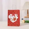 Bolsa de regalo de papel Kraft al por mayor en stock festiva bolsa de regalo de amor empaque Día de San Valentín bolso de mano suministro directo de fábrica