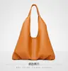 Bolsas Femininas 2024 Novas Bolsas de Ombro de Couro Macio de Grande Capacidade Bolsas Dumpling Femininas Moda Cor Sólida Bolsas Casuais de Ombro Transversais