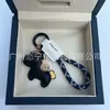 Dinero en el Caballo Cuero de Vaca Creativo Exquisito Casual Regalo de Pareja Bolso Lindo Colgante Llavero de Coche Llavero