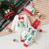 Conjunto Navideño para Bebé Manga Larga Body con Pajarita Overol Estampado de Dinosaurios por Todas Partes Gorro En Stock Conjunto de Tres Piezas para Recién Nacido