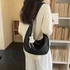 Bolsa transversal casual minimalista transfronteiriça feminina 2026 nova retrô versátil bolsa de ombro único compras deslocamento bolsa bolinho