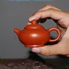 Tetera de arcilla Zhuni de Chaozhou, tetera mini de arcilla púrpura, micro tetera de bolsillo, tetera pequeña, taza de té pequeña y tetera