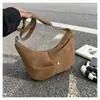Bolsa de Ombro Casual Estilo Coreano para Trabalho Bolsa Dumpling para Mulheres Inverno 2025 Nova Textura de Alto Padrão Estilo Estrangeiro Bolsa de Ombro Único Transversal