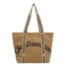 Bolsa tote casual y elegante para mujer, nuevo modelo 2025, única, simple, moderna, bolso de mano de nicho y bolsa de hombro para compras