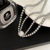 Collar de perlas de azúcar de doble capa para otoño e invierno, nuevo collar de perlas Shijia de lujo ligero de nicho, cadena de suéter de alta calidad para mujeres