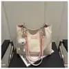 Bolsa de Ombro Versátil Feminina de Grande Capacidade Estilo Novo para Viagens Internacionais, Estudantes Universitários, Trabalho, Uso Casual, Moda de Nicho e Passeios Bolsa Tote