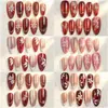 24 PIEZAS Colección de Arte para Uñas Bestseller Transfronterizo Navidad Halloween Flor Uñas Portátiles Ojo de Gato Halloween Piezas de Uñas Portátiles