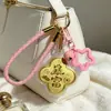 Llavero de Princesa Dorado de Moda Famoso en Internet con Cordón Rosa, Colgante para Bolso, Regalo, Pequeño Regalo al por Mayor