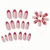 Nuevas uñas postizas rojas de almendra francesa de 24 piezas para Navidad con decoración de lazo, un superventas transfronterizo