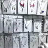 Loja de 2 yuans Conjunto de colar com corrente para clavícula, anel e brincos femininos, terno de combinação, pequeno presente, joias para estudantes