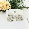 Aretes geométricos de acero inoxidable, broqueles dorados simples y elegantes, aretes colgantes versátiles a rayas estilo ins, joyería geométrica