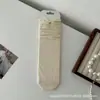 Calcetines Finos Estilo Chanel 2025 Nuevos de Caña Media Transpirables con Lazo de Encaje de Puntos para Primavera y Verano Flores Prellis Calcetines de Hilo para Niños