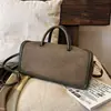 Nuevos dijes para bolso Otoño/Invierno 2026 Forma horizontal simple Bolso versátil de alta gama para mujer Bolso de mano vintage