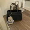 Bolsa Kelly de Grande Capacidade Transfronteiriça para Mulheres Moda Outono/Inverno 2026 Nova Bolsa de Mão para o Dia a Dia Versátil Bolsa de Ombro Bolsa Transversal