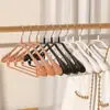 Colgador de plástico directo de fábrica multifuncional antideslizante sin costuras de hombro ancho para colgar ropa en casa, soporte grueso para secar ropa